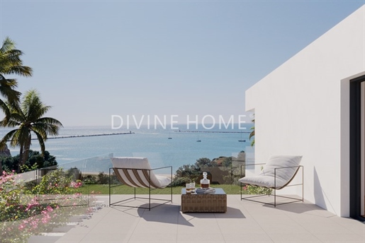 Maison de luxe avec vue imprenable sur la mer, jardin et garage privé