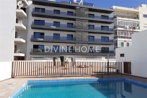 Apartamento novo de segundo andar em condomínio privado com piscina em Olhão