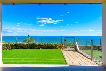 Spectacular ground floor flat with private garden and stunning sea views.