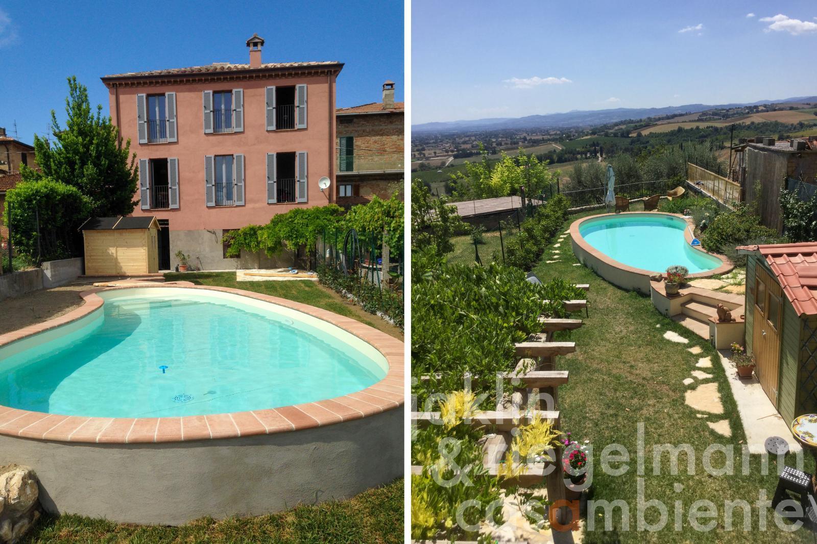 Village house with garage, garden, swimming pool, and stunning views south over the Tiber Valley
