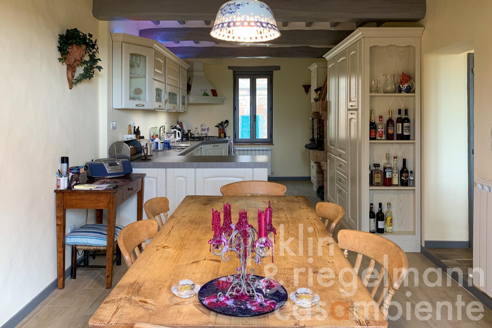 Village house with garage, garden, swimming pool, and stunning views south over the Tiber Valley