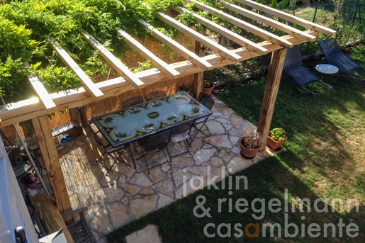 Village house with garage, garden, swimming pool, and stunning views south over the Tiber Valley
