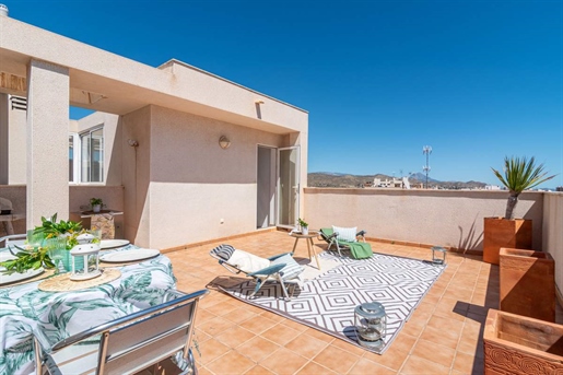 In the heart of the picturesque town of El Campello, near the tram station, shops, local market, and