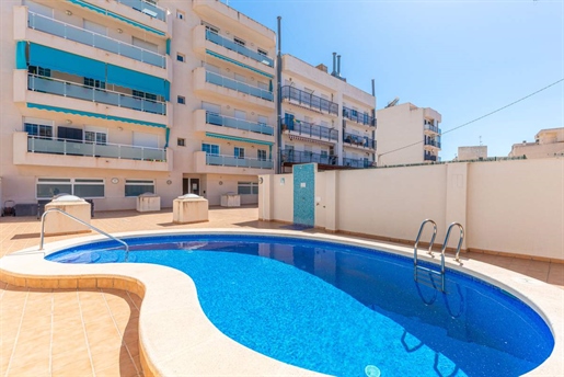In the heart of the picturesque town of El Campello, near the tram station, shops, local market, and