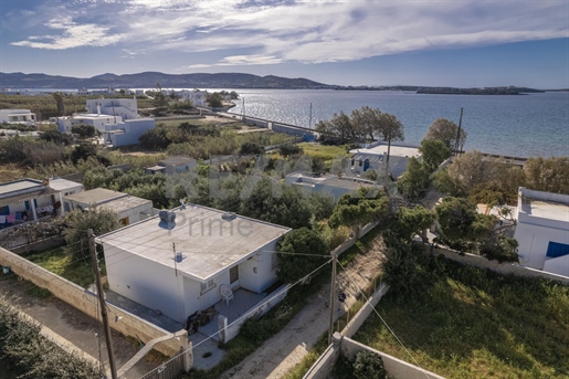 834566 - Plot of land with an old house and a new building permit in Pounta of Paros, 220 sq.m., €21