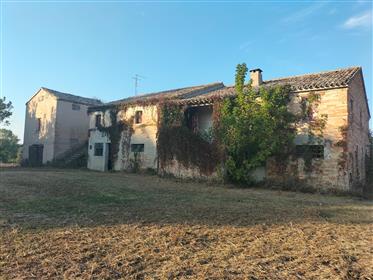 Old farmhouse with a panoramic view of the Musone river valley