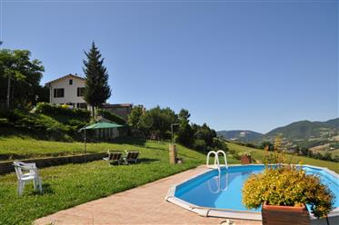 Country house completely rebuilt in 6 furnished apartments in Piticchio di Arcevia