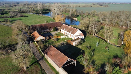 Country property with pond and swimming pool