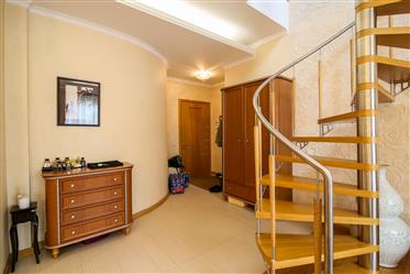 An exclusive furnished two-story apartment with a terrace.