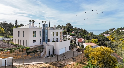 Buy modern design villa for sale with sea views within walking distance from Carvoeiro, Algarve