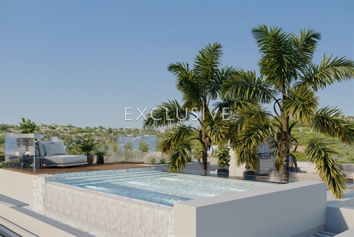New luxury villa for sale in Carvoeiro, 1 km from beach. Modern design, rooftop swimming pool