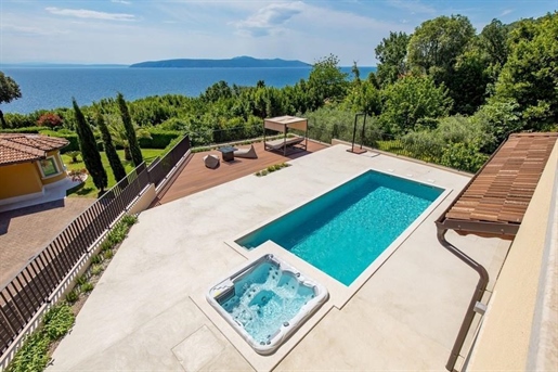 Newly built Mediterranean villa on a high cliff, first row to the sea