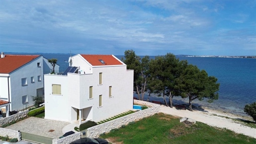 Beautiful villa of a unique location first row to the sea in Zadar area