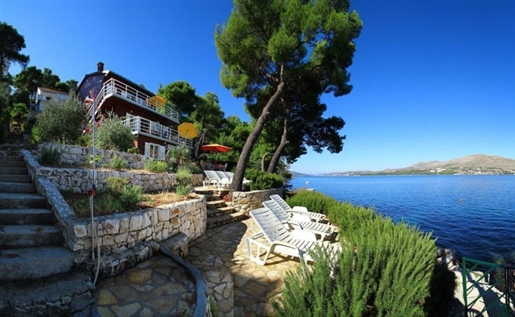Seafront house with 3 apartments, terraces and private beach on Ciovo, Trogir