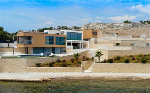 Stunning 1st line designer villa near Zadar with almost private beach and mooring possibility