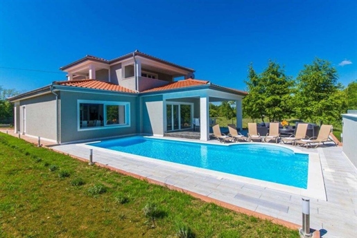 New villa in authentic style with pool and landscaped garden in Labin area