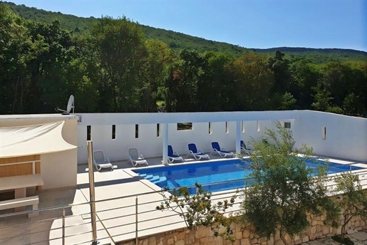 Spacious apart-hotel of 8 residential units with swimming pool in Rabac less than 1 km from the sea