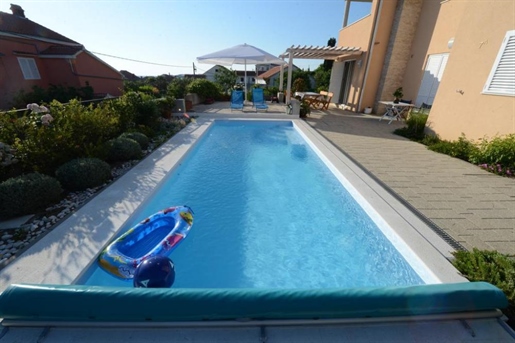 Nice villa of two apartments just 100 meters from the sea in popular and friendly Petrcane!