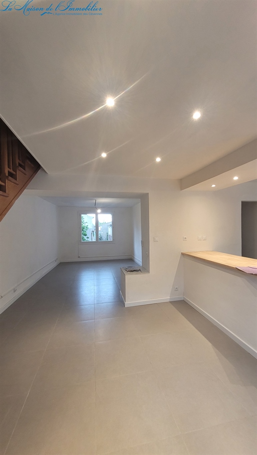 Village house with garage, courtyard and terrace.