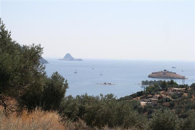 Plot of land, 250 metres from the sea, with panoramic views of the sea and Poros