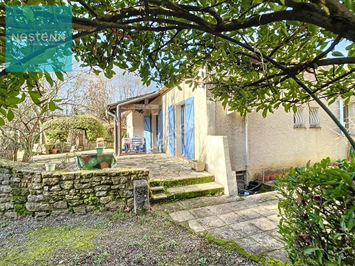 For sale single-storey house of 100m², 4 bedrooms, garage, garden of 3040m², 10 minutes from