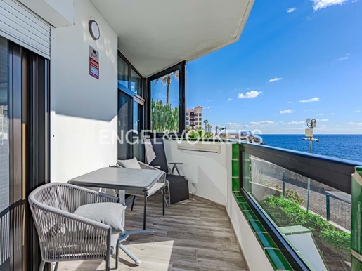 Apartamento con terraza en primera línea