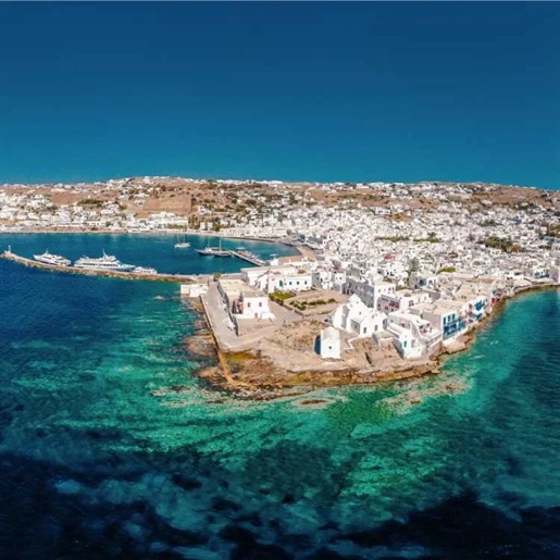 Plot in Mykonos 2,200sqm with two buildings of 140sqm. Near the beaches.