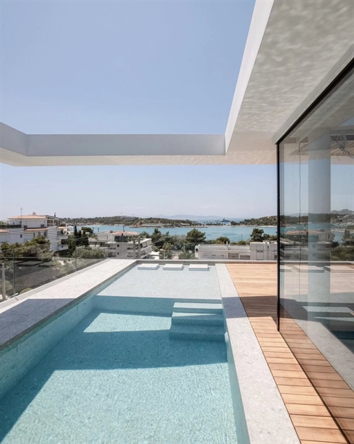 Duplex apartment under construction for sale in Glyfada with private pool.