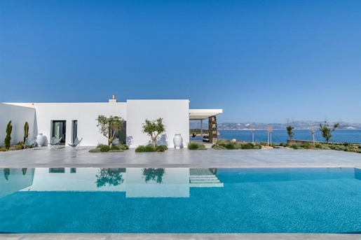 Villa with a guest house for sale in Filizi are of Paros island, in first line of sea with open sea