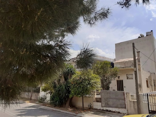 Plot with an old house for sale in Ano Glyfada. Unobstructed view.