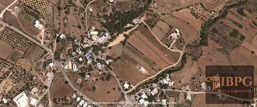 3,440 m² plot in Paros with a 1,200 m² ready-to-build permit.