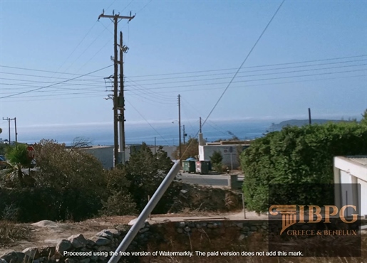 3,440 m² plot in Paros with a 1,200 m² ready-to-build permit.