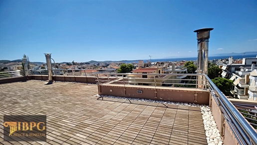 Exclusive maisonette with panoramic sea view in Athens Riviera. The two level maisonette offers 250
