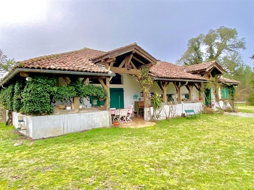 Charming detached house with outbuilding set on 5000m2.