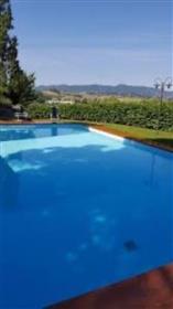 Casale con vista sulle colline toscane con splendida piscina