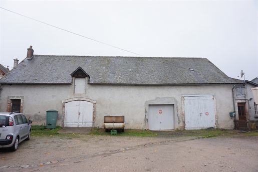 Lot including hotel, barn garages and apartment