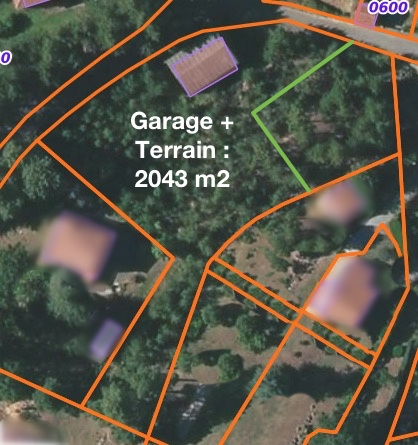 Terrain constructible de 2043 m2 environ avec 1 garage de 176 m2 environ