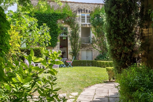 Very private village property with 7 bedrooms, pool and beautiful gardens.