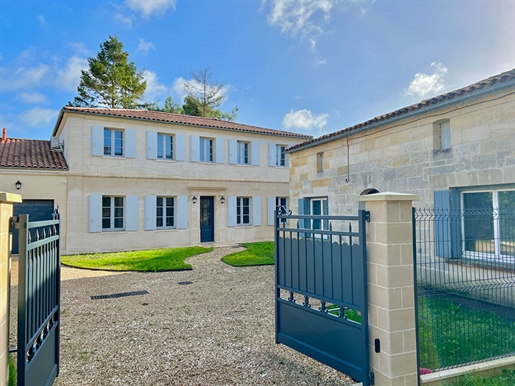 Magnificent property with high-end fittings located in the heart of a small village close to Saint-E