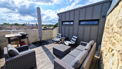 Listed 19th-century town house with panoramic 40m² roof terrace.