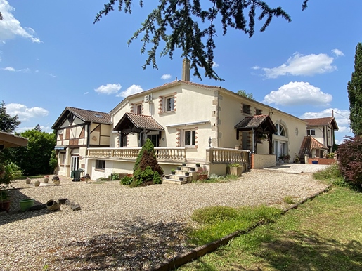 This stunning property offers an abundance of space with a main home, gite and outbuildings. The gar