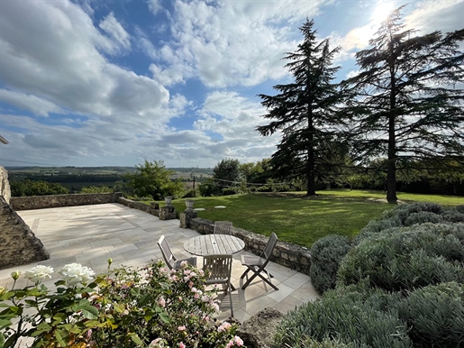 This beautiful stone property is located in a quiet, elevated position with stunning views of the su