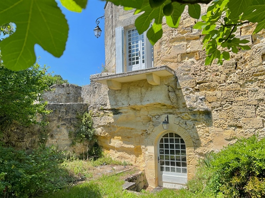 This impressive stone house takes its origins in the 12th century. Set within the walls of medieval