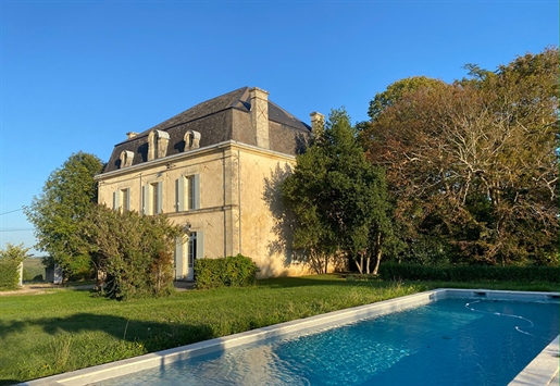 This magnificent 19th century manor house is located only minutes from a pretty village in the Entre
