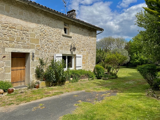 Located between Branne and Creon this property is comprised of a converted stone main home, a one-be