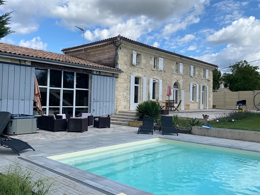 Attractive stone property with swimming pool renovated in a contemporary style whilst keeping its or