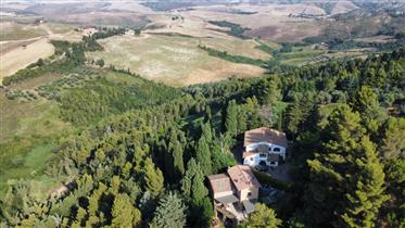 For sale farmhouse with 2.5 hectares of land in the first countryside of Volterra
