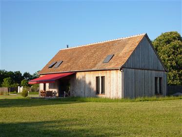 Casa dell'architetto a cornice di legno