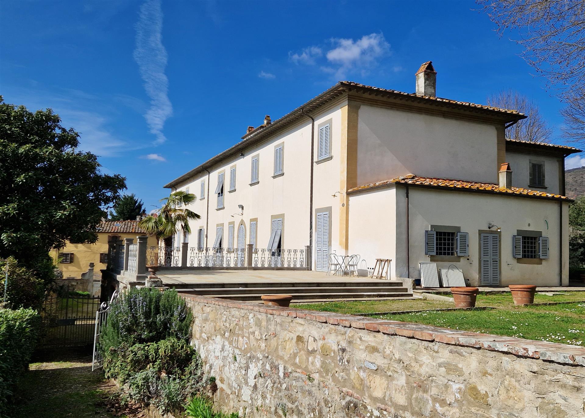 Restored centuries old villa surrounded by gardens and park with monumental trees