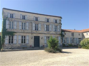 A beautiful elegant French house completely renovated with great business potential.